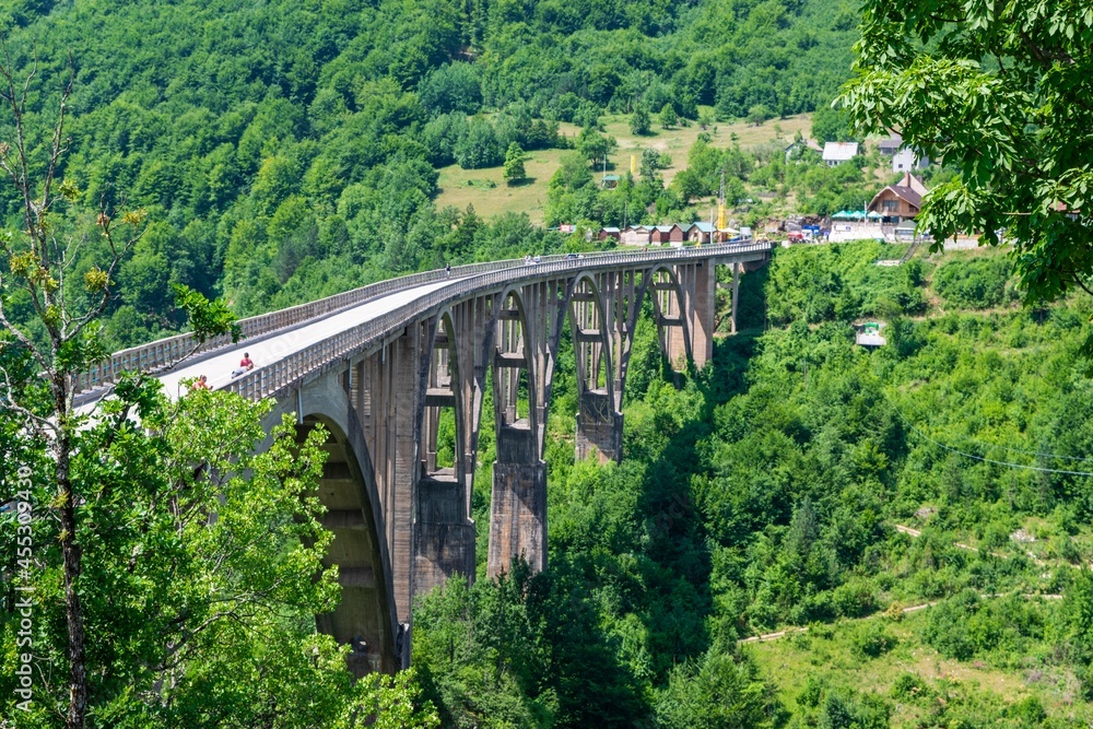 Concrete arch Durdevica Tara Bridge over Tara Canyon River in northern Montenegro. Concrete arch Durdevica Tara Bridge over Tara Canyon River in northern Montenegro.