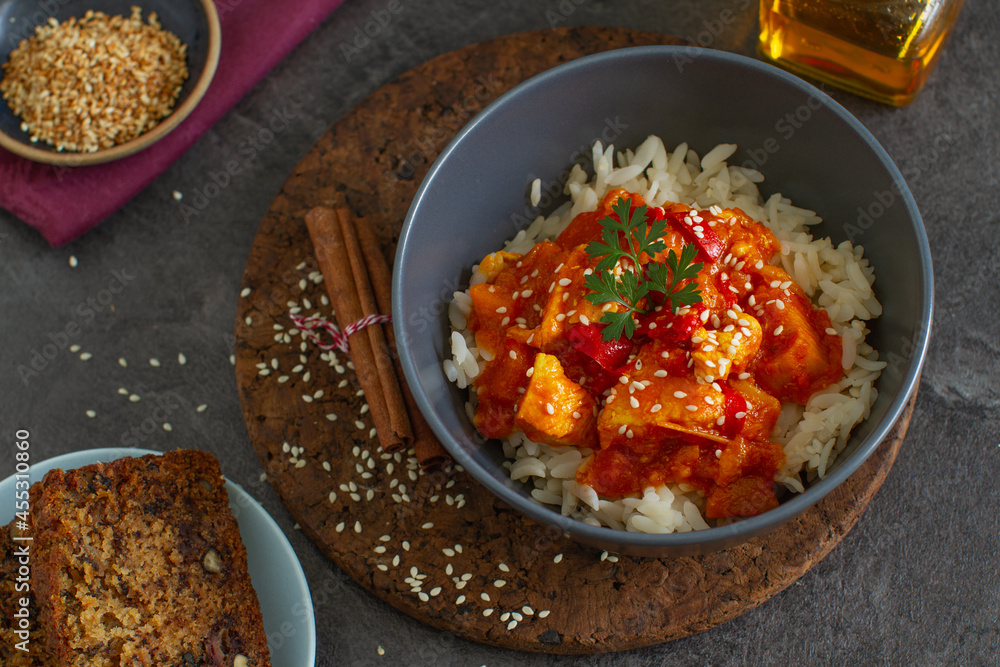 Sesame teriyaki chicken and ginger rice on a table Sesame teriyaki chicken and ginger rice on a table