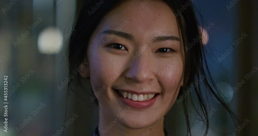Portrait beautiful asian woman smiling happy in city at night