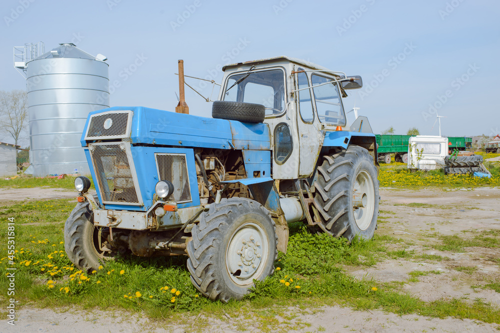Old farm tractor rusted and broken Old farm tractor rusted and broken