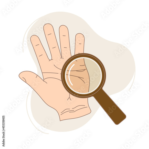 Palmistry. A palm with lines of fate and a magnifying glass.