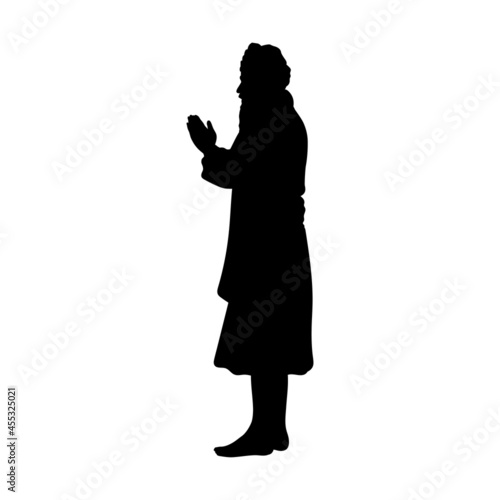 Silhouette Indian man in greeting or praying pose. Indian culture and religion.