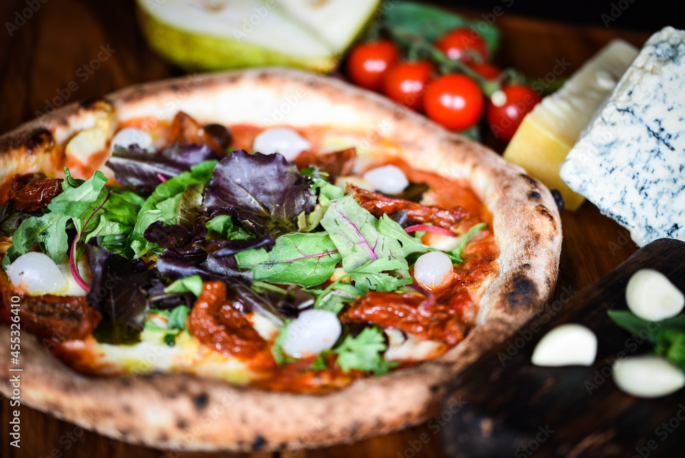 delicious Italian pizza with fresh ingredients delicious Italian pizza with fresh ingredients