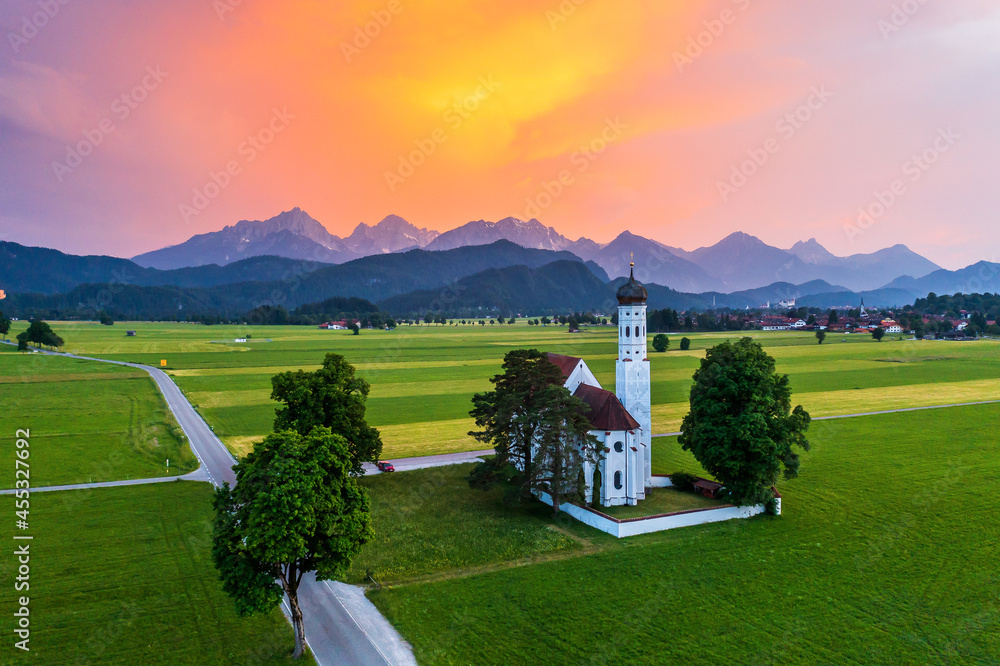 Schwangau, Germany. Aerial view of Saint Coloman church at sunset.