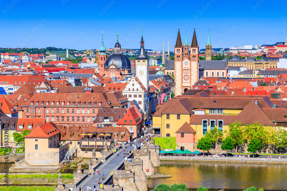 Obraz premium Wurzburg, Germany. Old Town skyline with the towers of St Kilian Cathedral, Neumunster church and the Chapel of St Mary.