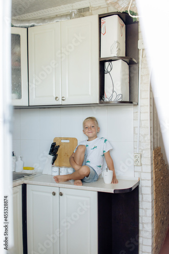 child in kitchen
