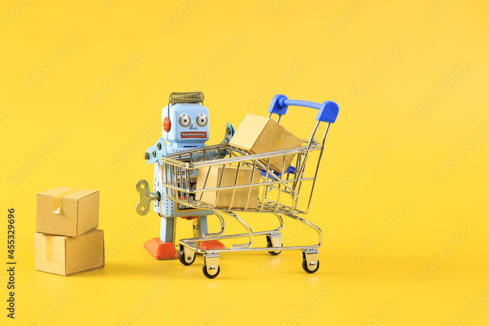 vintage classic robot and online shopping concept with shopping cart symbol