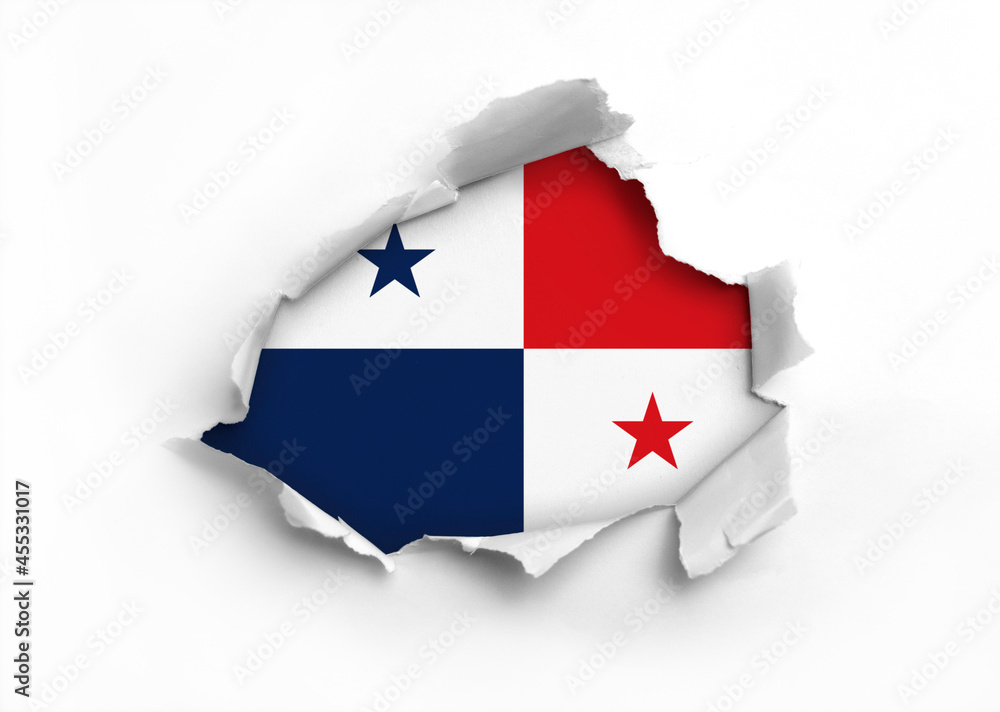 Flag of Panama underneath the ripped paper