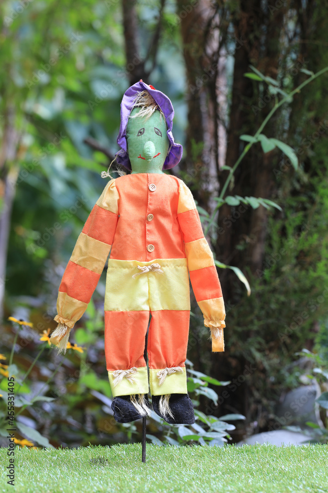 funny garden scarecrow on the lawn funny garden scarecrow on the lawn