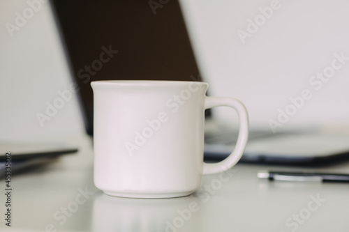 A mock-up of a classic cup of coffee mug that will allow you to present a logo or typography piece in a natural way