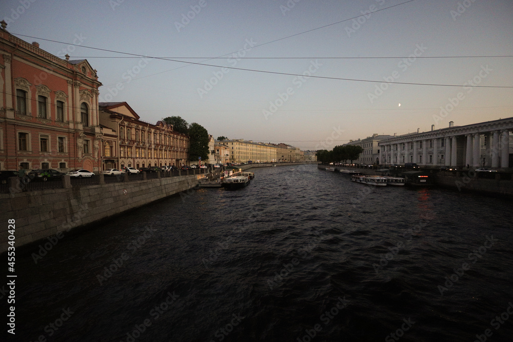 view of the street on the water in the evening