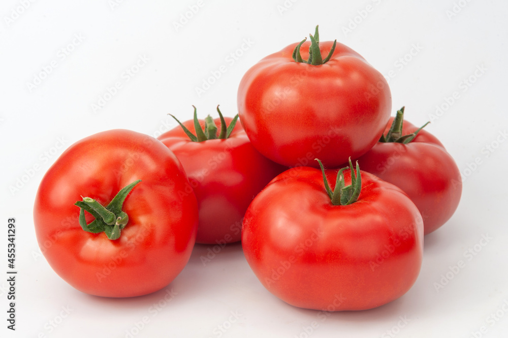 bunches of tomatoes on a white background bunches of tomatoes on a white background