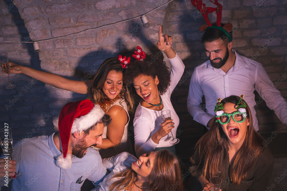 Fototapeta premium Friends having fun at New Year's Eve party