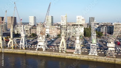 Drone footage of Antwerp old historical cranes in lovely afternoon light photo