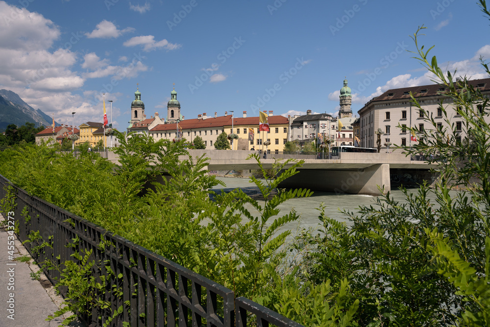 Innsbruck cityscape with the bridge over the river Eno and the old town in the background, Tyrol, Austria