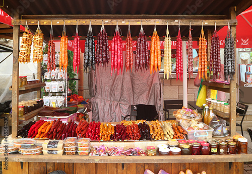 Candle Shaped Multi-color Georgian Traditional Sweets Called Churchkhela Displayed on a Stall