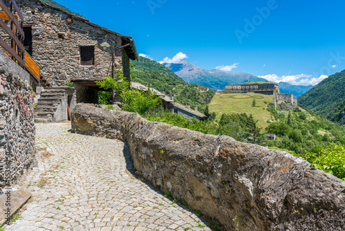 The picturesque village of Exilles and its fortress, in the Susa Valley. Province of Turin, Piedmont, northern Italy. photo