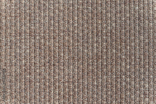 Background of large brown textile. Fabric background texture. Large detailed horizontal textured macro.