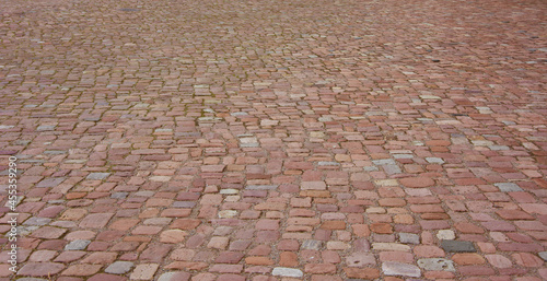 Old cobblestone pavement. Stone vintage paved road photo