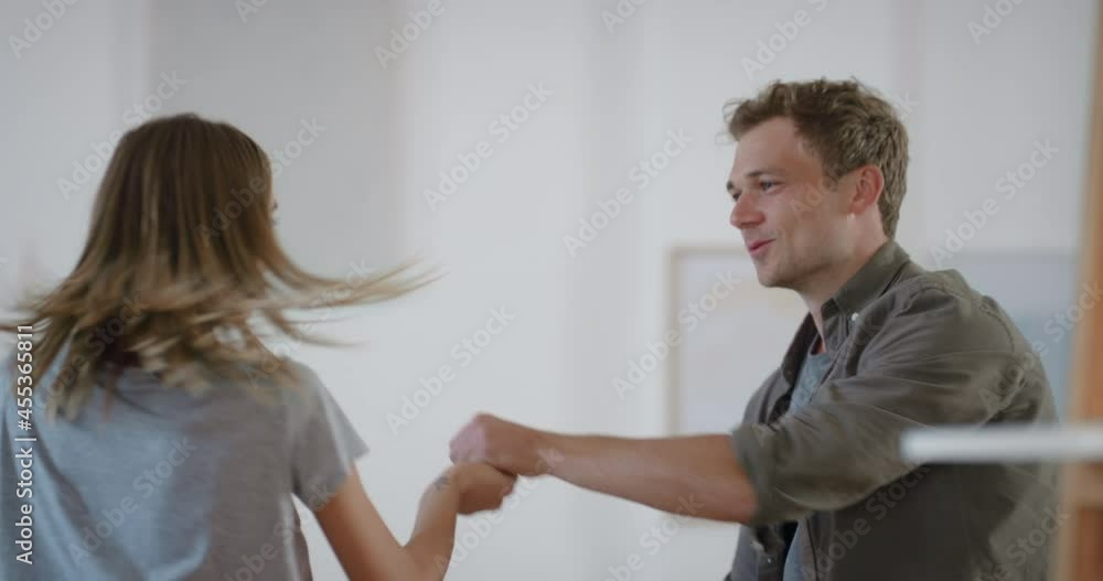 dancing couple celebrating having fun dance in kitchen enjoying playful romantic relationship at home 4k footage dancing couple celebrating having fun dance in kitchen enjoying playful romantic relationship at home 4k footage