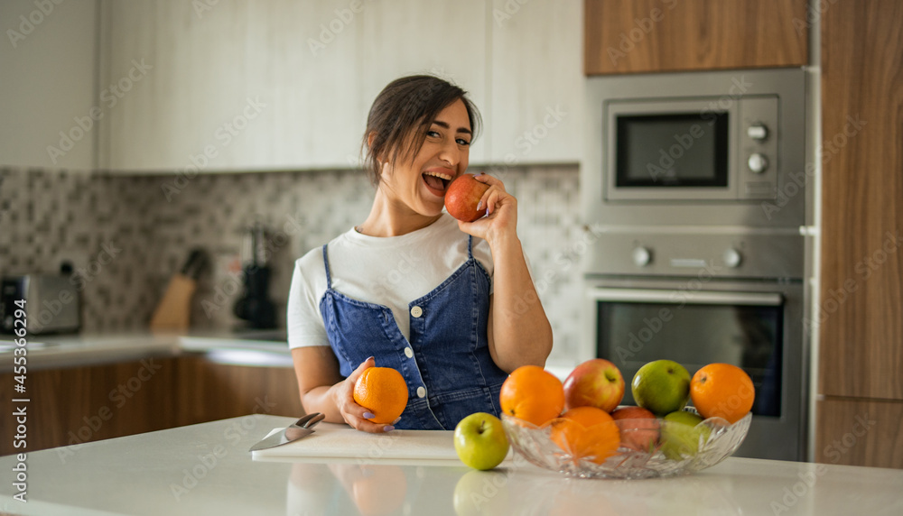 Italian woman cooking vegan fruit salad
