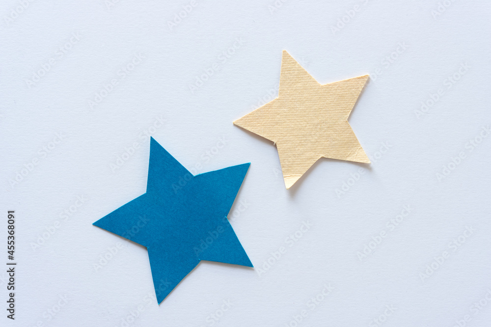 paper stars on a light background paper stars on a light background