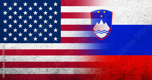United States of America (USA) national flag with Slovenia National flag. Grunge background photo