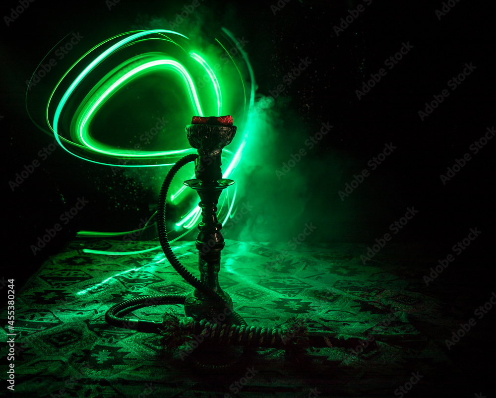 Hookah hot coals on shisha bowl with black background. Stylish oriental shisha. Shisha Concept Hookah hot coals on shisha bowl with black background. Stylish oriental shisha. Shisha Concept