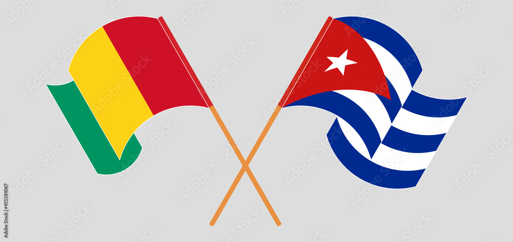 Crossed and waving flags of Guinea and Cuba Crossed and waving flags of Guinea and Cuba