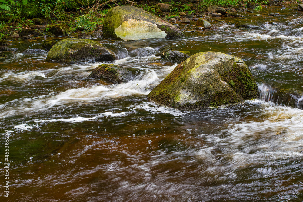 water in motion in a brook in central massachussetts water in motion in a brook in central massachussetts