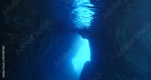 Wallpaper Mural cave scenery underwater exploring caves and having fun ocean scenery sun beams and rays background scuba divers to explore Torontodigital.ca
