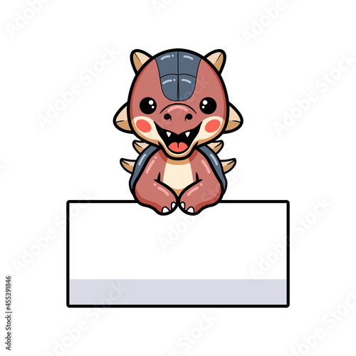 Cute little ankylosaurus dinosaur cartoon with blank sign