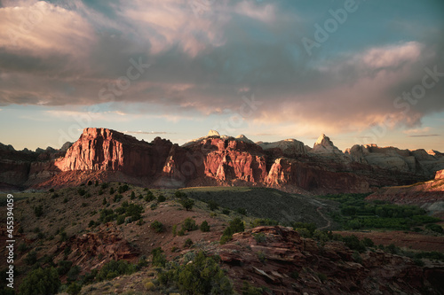 Light Shines on Red Cliffs from Scenic Drive