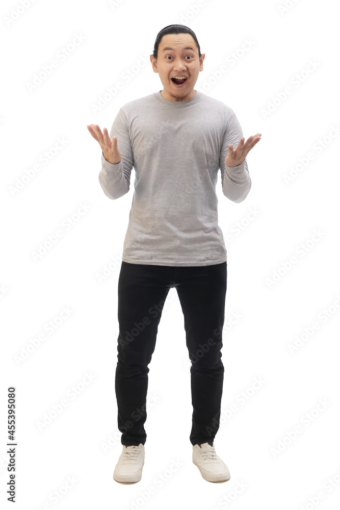 Man wearing casual grey shirt black denim and white shoes, excited surprised shocked with mouth open looking at camera, amazed wow espression. Full body portrait isolated Man wearing casual grey shirt black denim and white shoes, excited surprised shocked with mouth open looking at camera, amazed wow espression. Full body portrait isolated