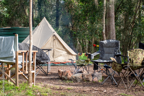 Family tent setup at the campsite surrounding by nature in holiday park photo