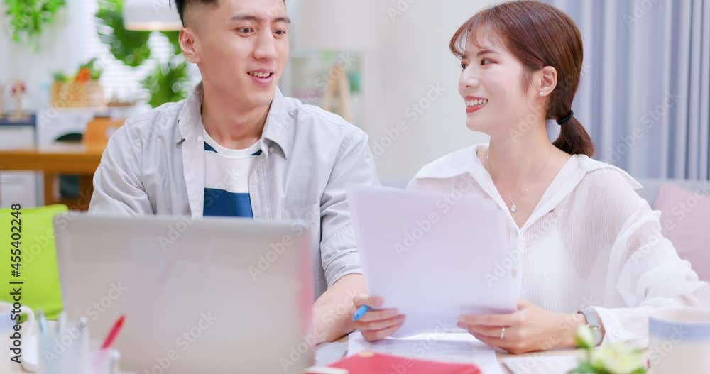 couple discuss finances at home couple discuss finances at home