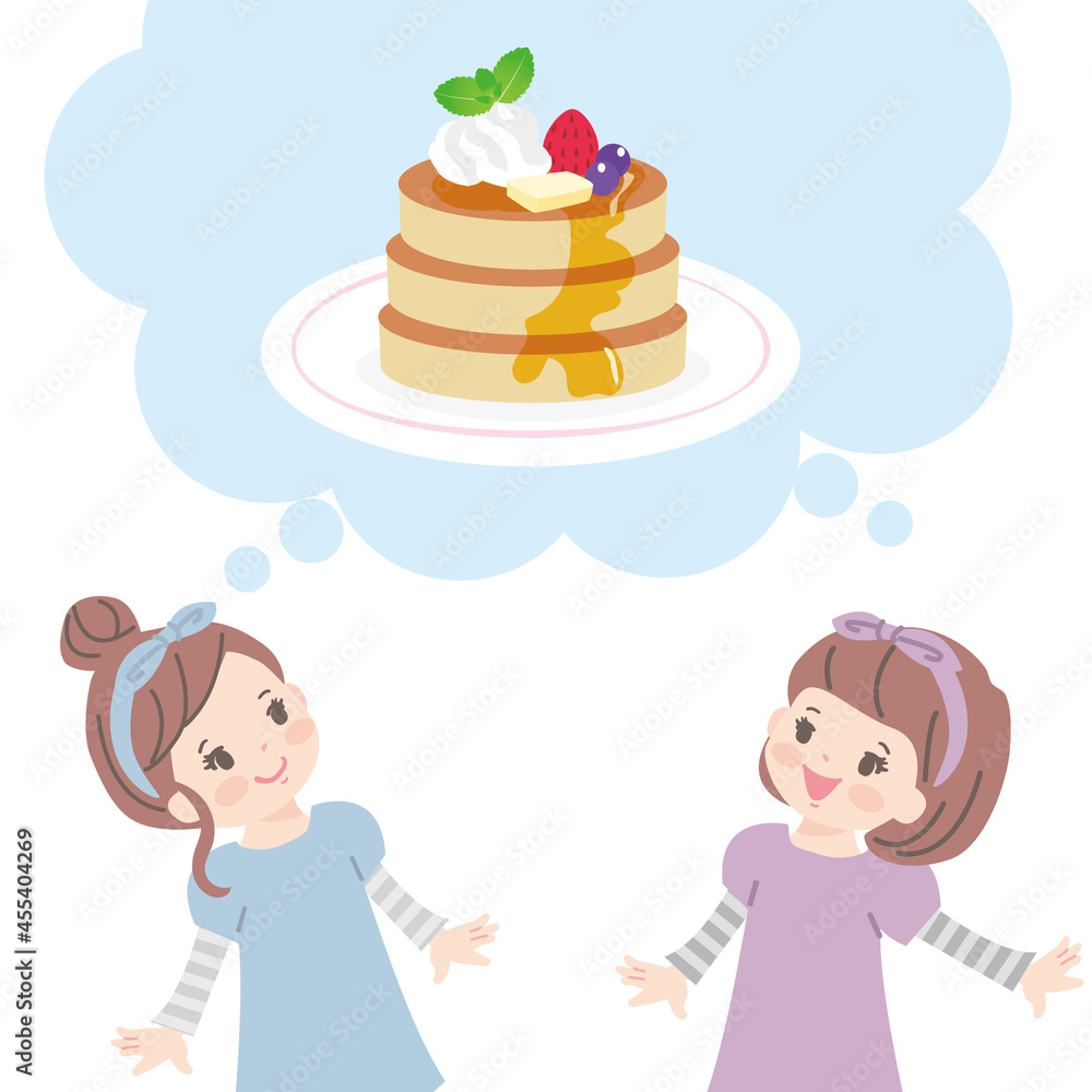 パンケーキを食べようと相談している笑顔のの子 パンケーキを食べようと相談している笑顔のの子