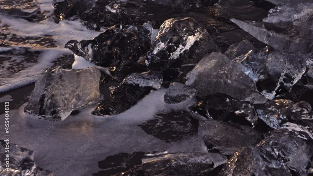 surf over ice on Diamond Beach, Iceland surf over ice on Diamond Beach, Iceland