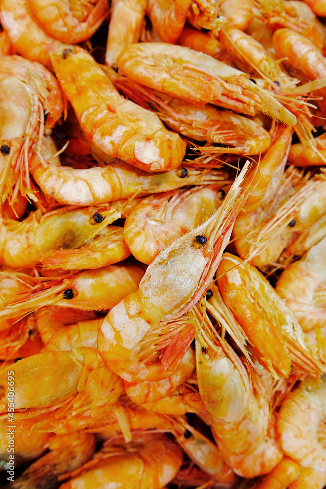 lots of red shrimp. a dish of fresh seafood. a natural source of protein. less meat consumption. selective focus lots of red shrimp. a dish of fresh seafood. a natural source of protein. less meat consumption. selective focus