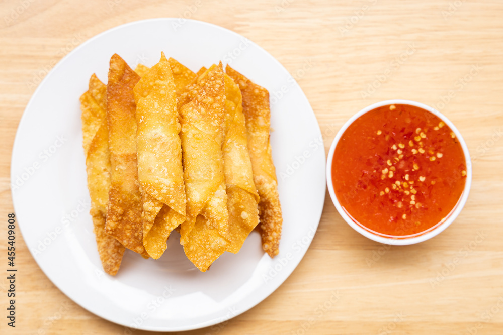 Fried pork wontons with sauce. Fried pork wontons with sauce.