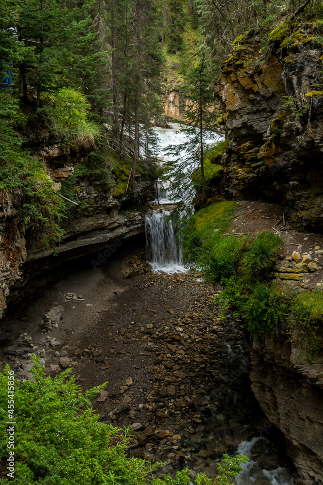 Waterfall at the Johnston Canyon in banff. Johnston Canyon, Alberta, Canada Waterfall at the Johnston Canyon in banff. Johnston Canyon, Alberta, Canada
