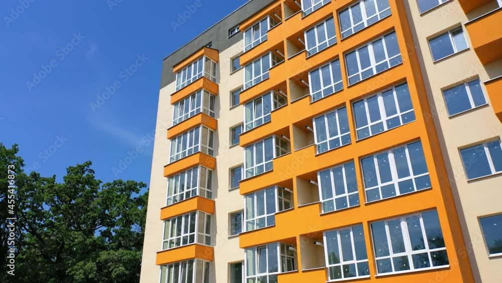 New modern apartment building. Aerial view of new house city multi-story apartment building New modern apartment building. Aerial view of new house city multi-story apartment building