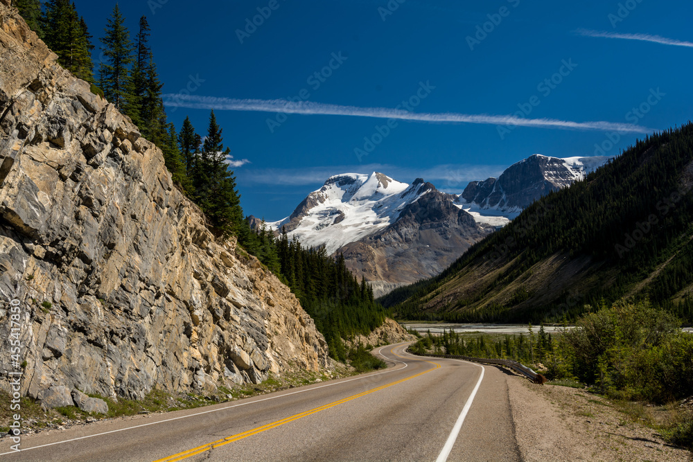 mountain road in Canada. Canadian mountains, clouds.