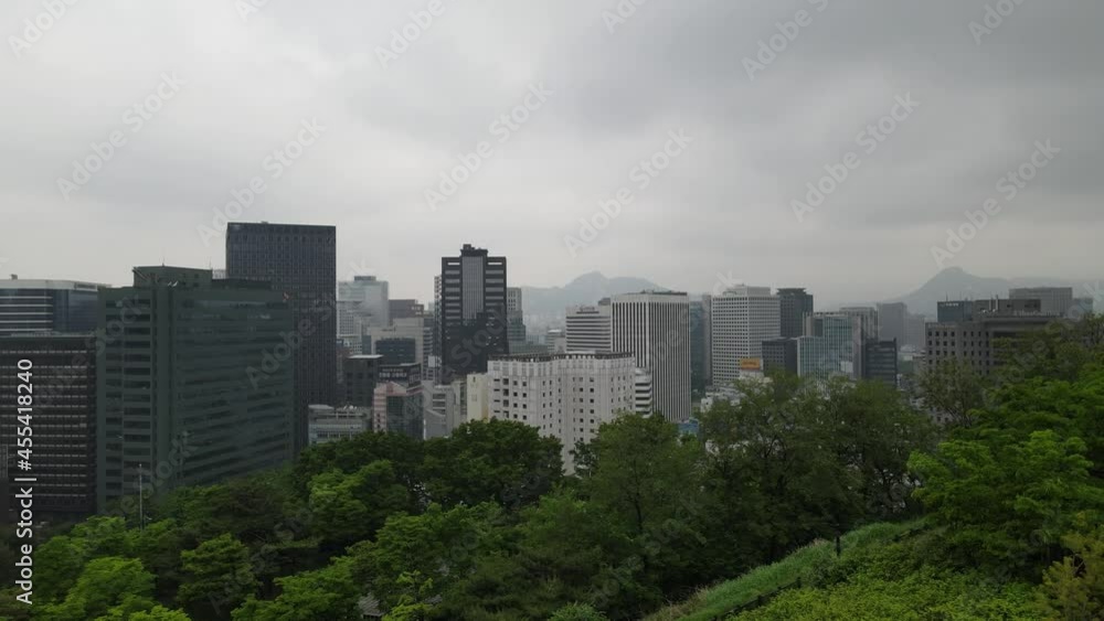 Drone shot flying close to skyscrapers in the city of Seoul in South Korea Drone shot flying close to skyscrapers in the city of Seoul in South Korea