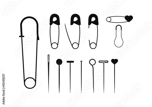 Safety fixing pin and needle black color set isolated on white background. Sewing safety pin haber collection. Flat design cartoon style vector illustration. photo