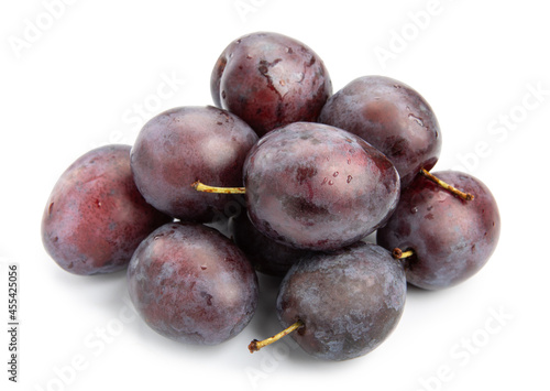 group of plums isolated on a white background.