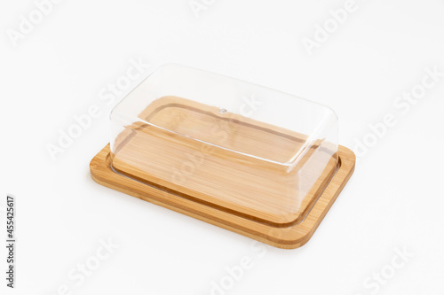 dishes for butter and cheese. small wooden cutting board with lid.