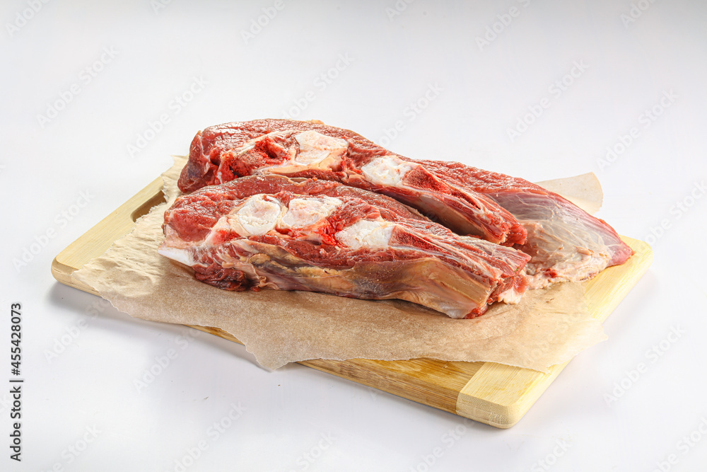 Raw bones for cooking over board