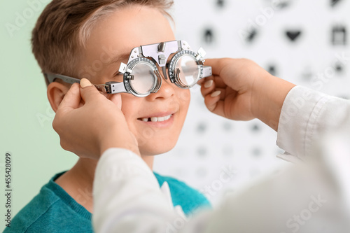 Little boy undergoing eye test in clinic