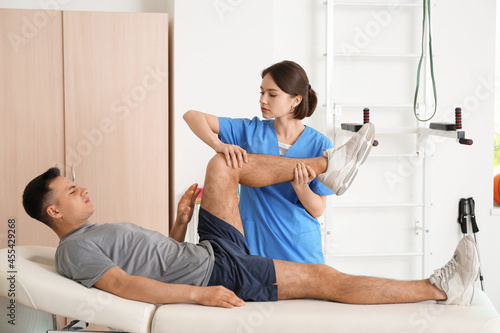 Physiotherapist working wit...